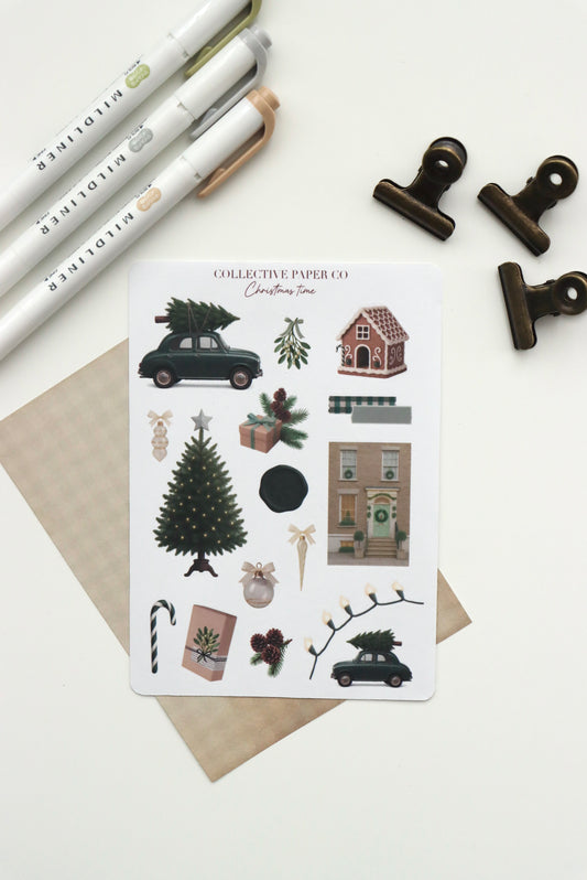 Decorative journaling sheet of kiss-cut vintage and realistic seasonal stickers of Christmas time in winter on Japanese washi paper