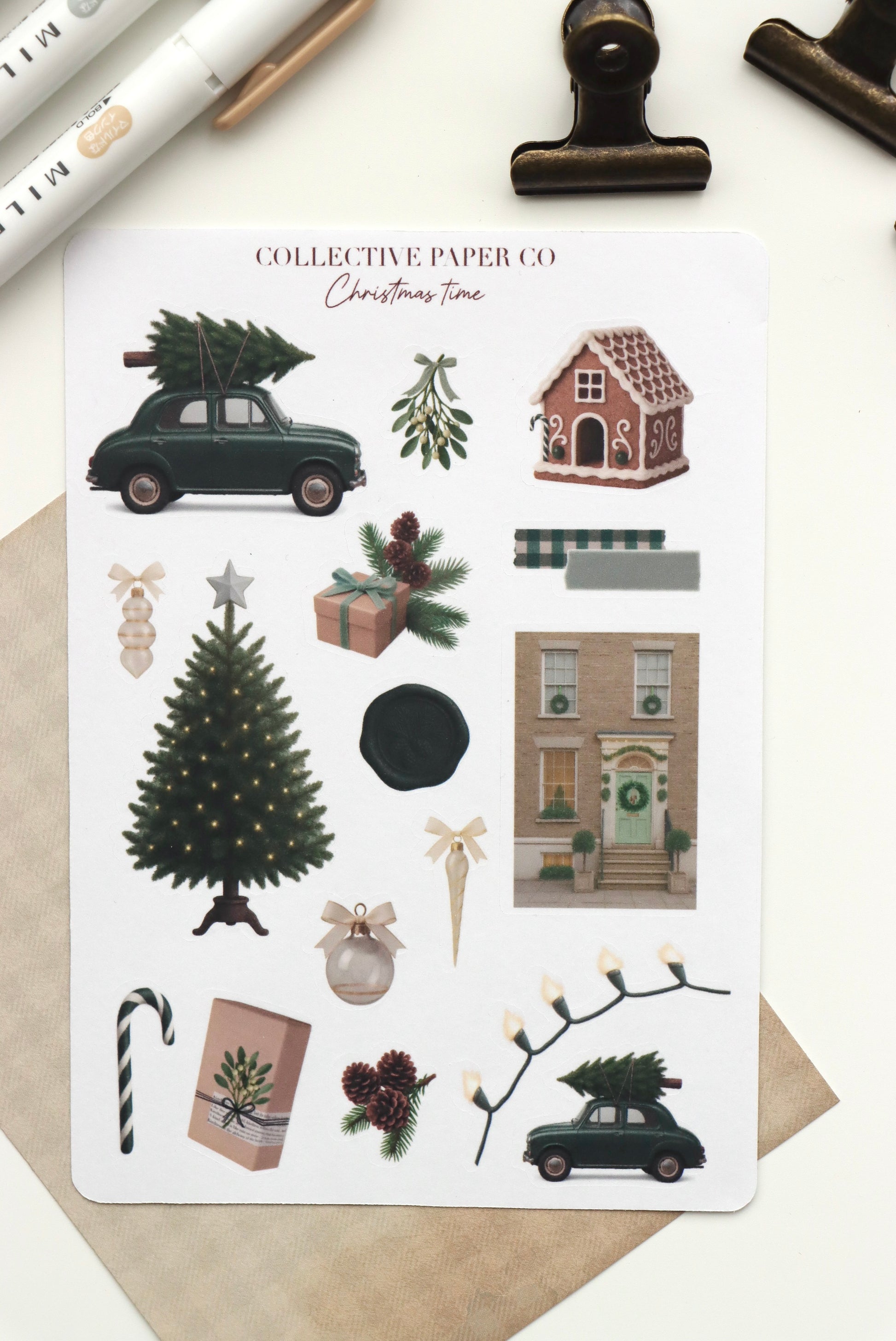 Decorative journaling sheet of kiss-cut vintage and realistic seasonal stickers of Christmas time in winter on Japanese washi paper