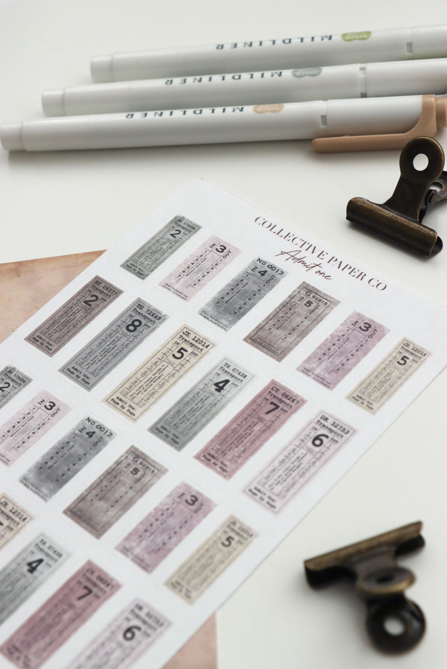 Decorative journaling sheet of kiss-cut vintage and realistic stickers of Admit one tickets on Japanese washi paper