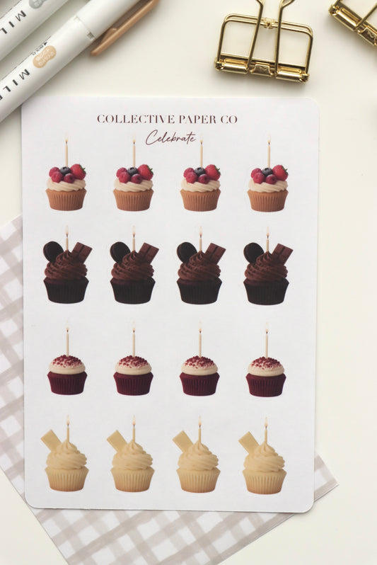 Decorative journaling sheet of kiss-cut vintage and realistic birthday cupcake stickers on Japanese washi paper