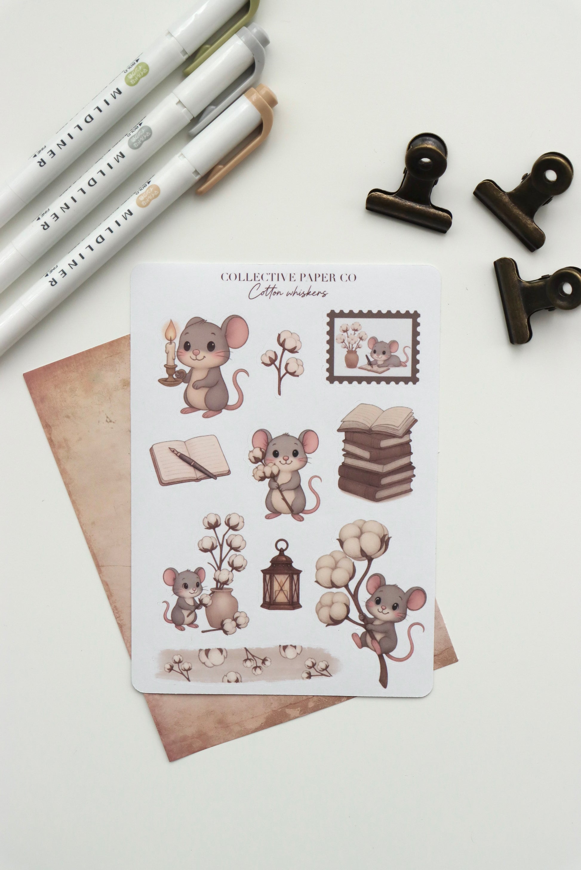 Decorative journaling sheet of kiss-cut stickers of Cotton Whiskers on Japanese washi paper