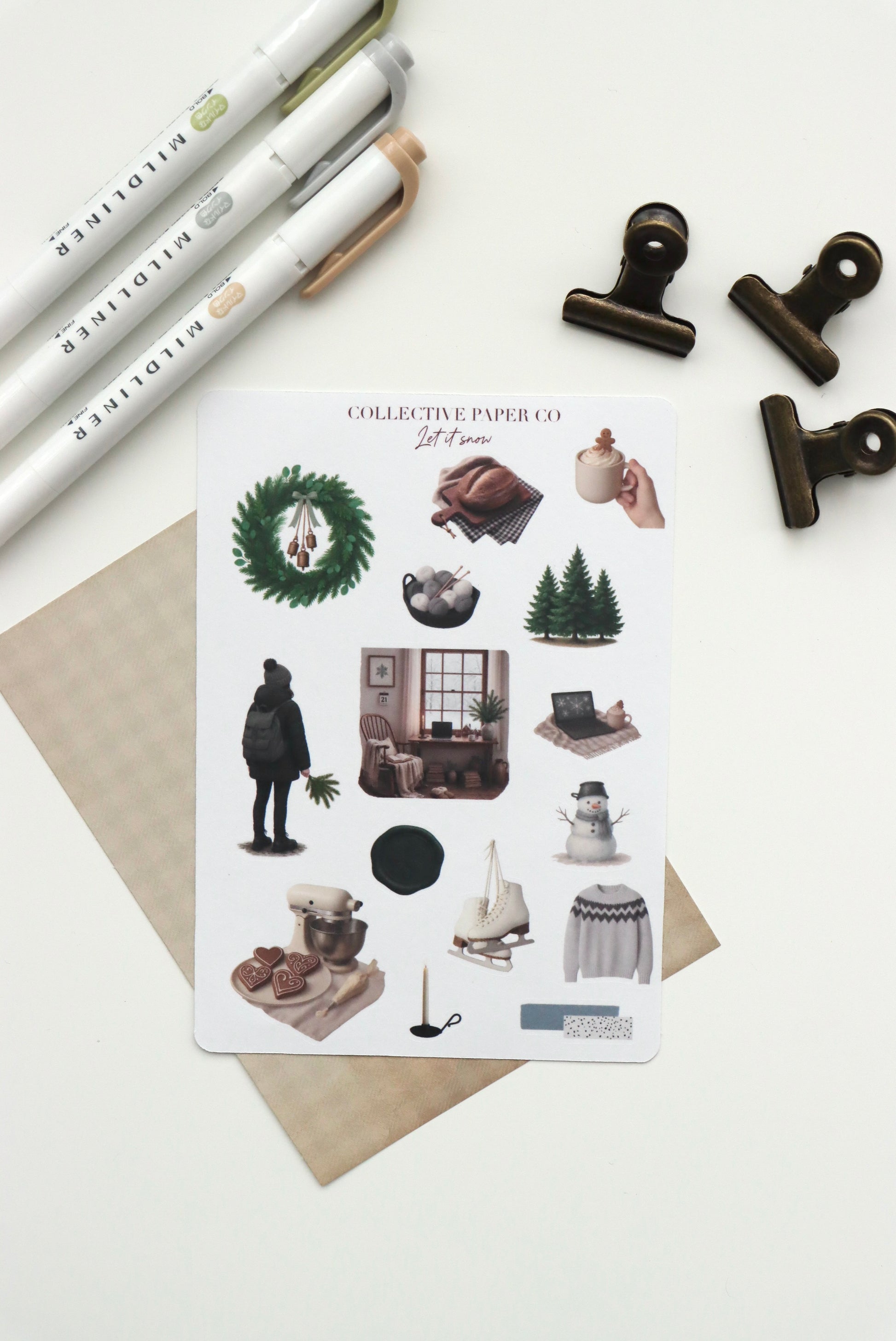 Decorative journaling sheet of kiss-cut vintage and realistic seasonal stickers of Let it snow in winter on Japanese washi paper