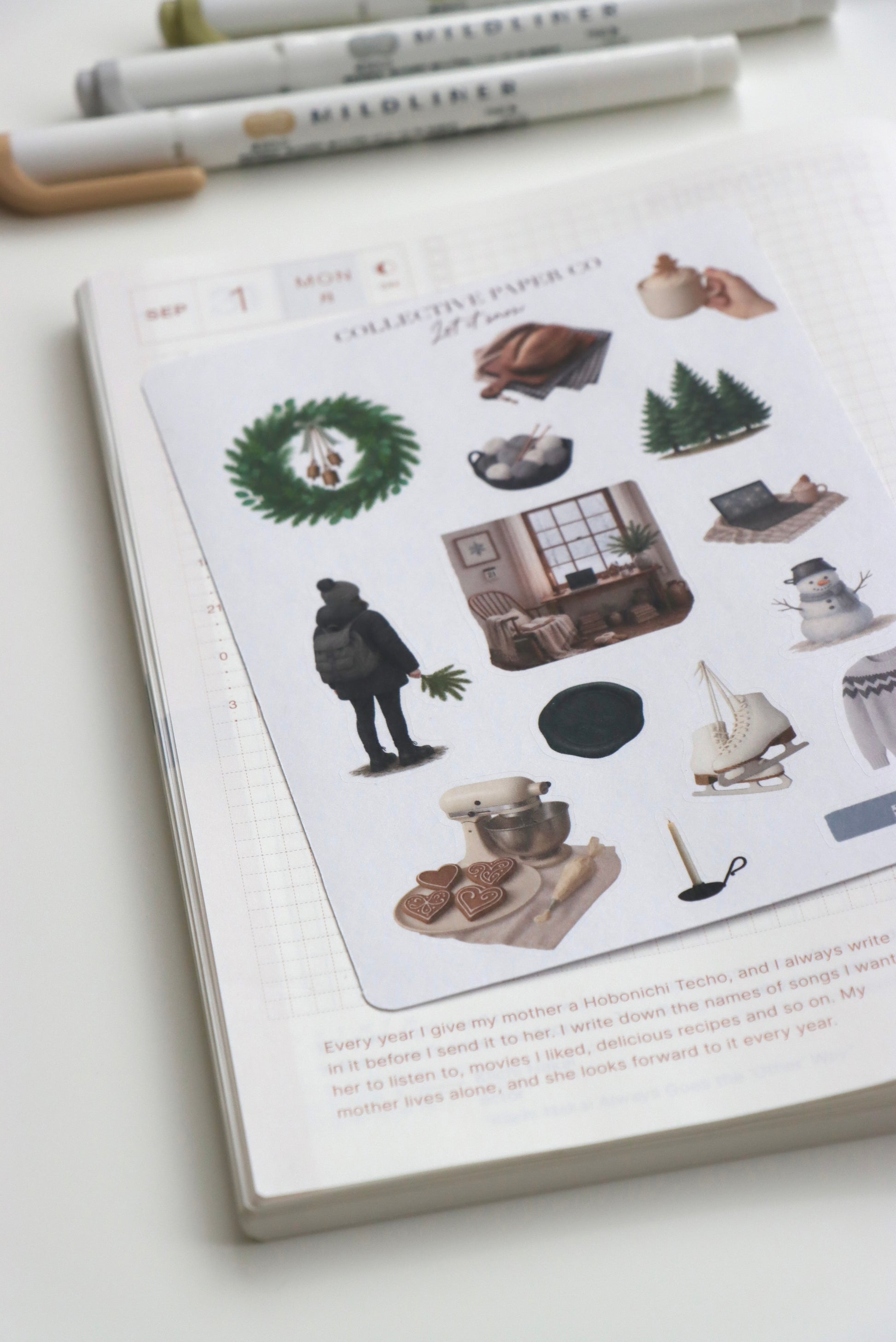 Decorative journaling sheet of kiss-cut seasonal stickers of Whiskers New Year 2026 celebration on Japanese washi paper