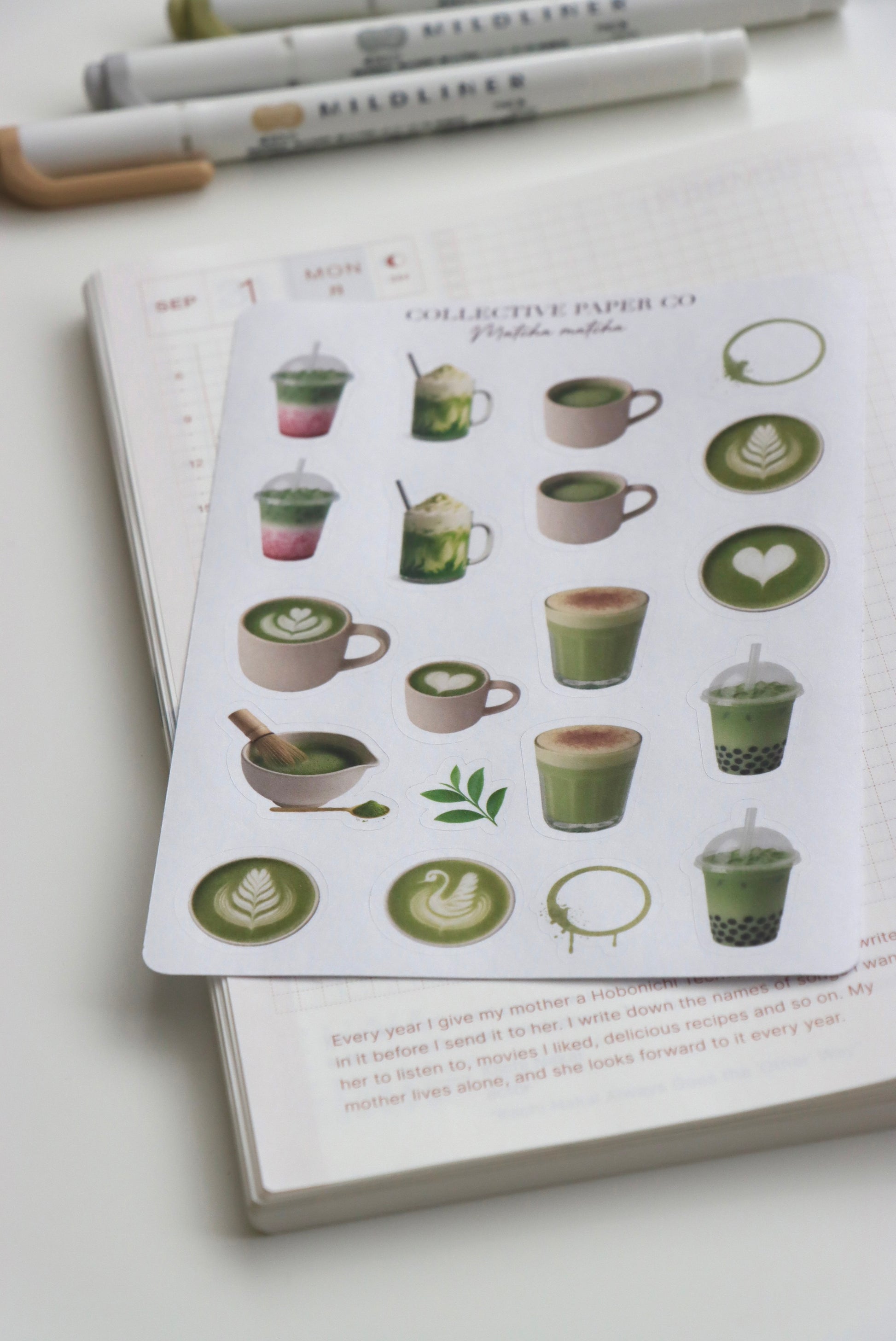 Decorative journaling sheet of kiss-cut vintage and realistic matcha stickers on Japanese washi paper