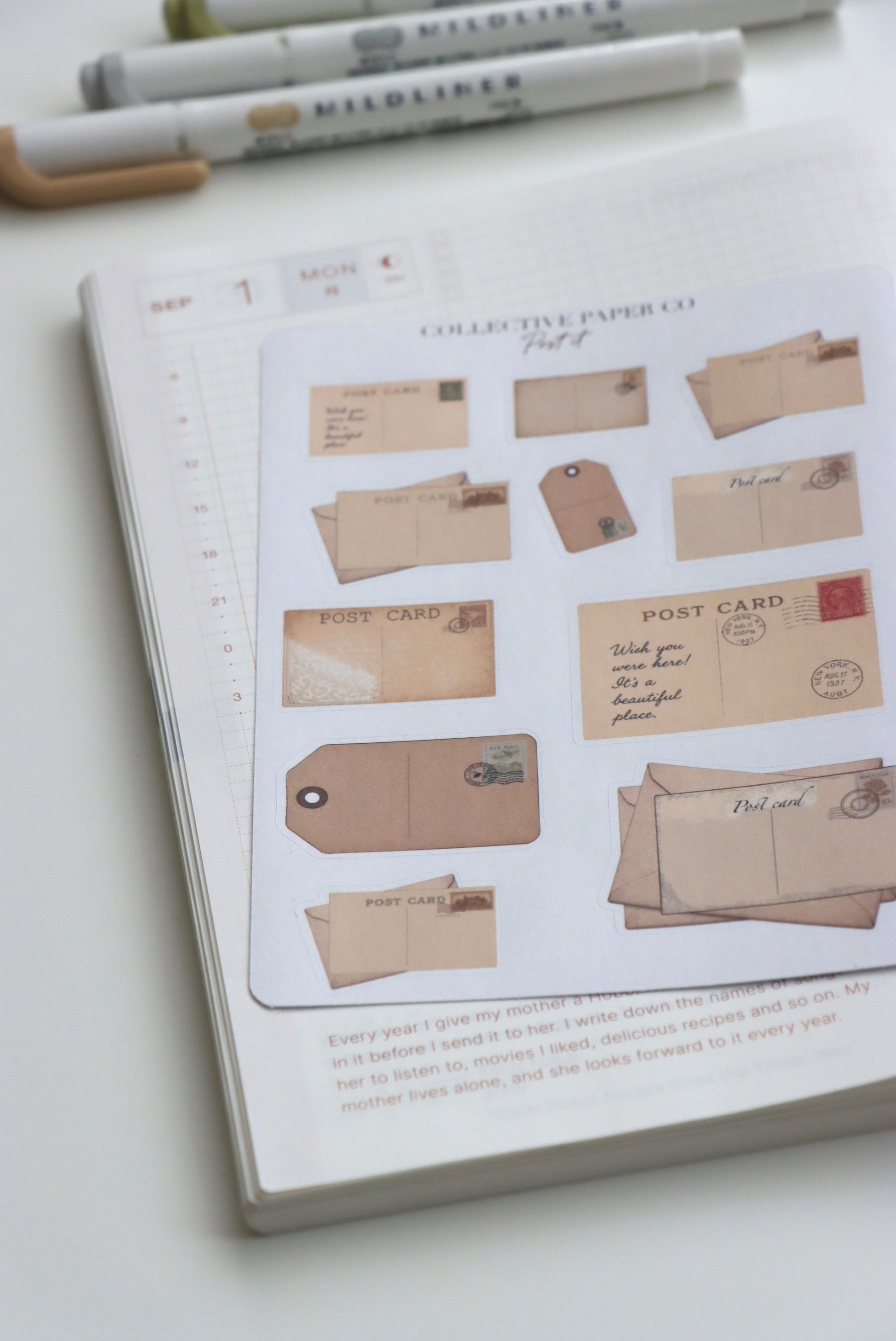 Decorative journaling sheet of kiss-cut vintage and realistic stickers of Post it on post cards, labels and letter envelopes on Japanese washi paper