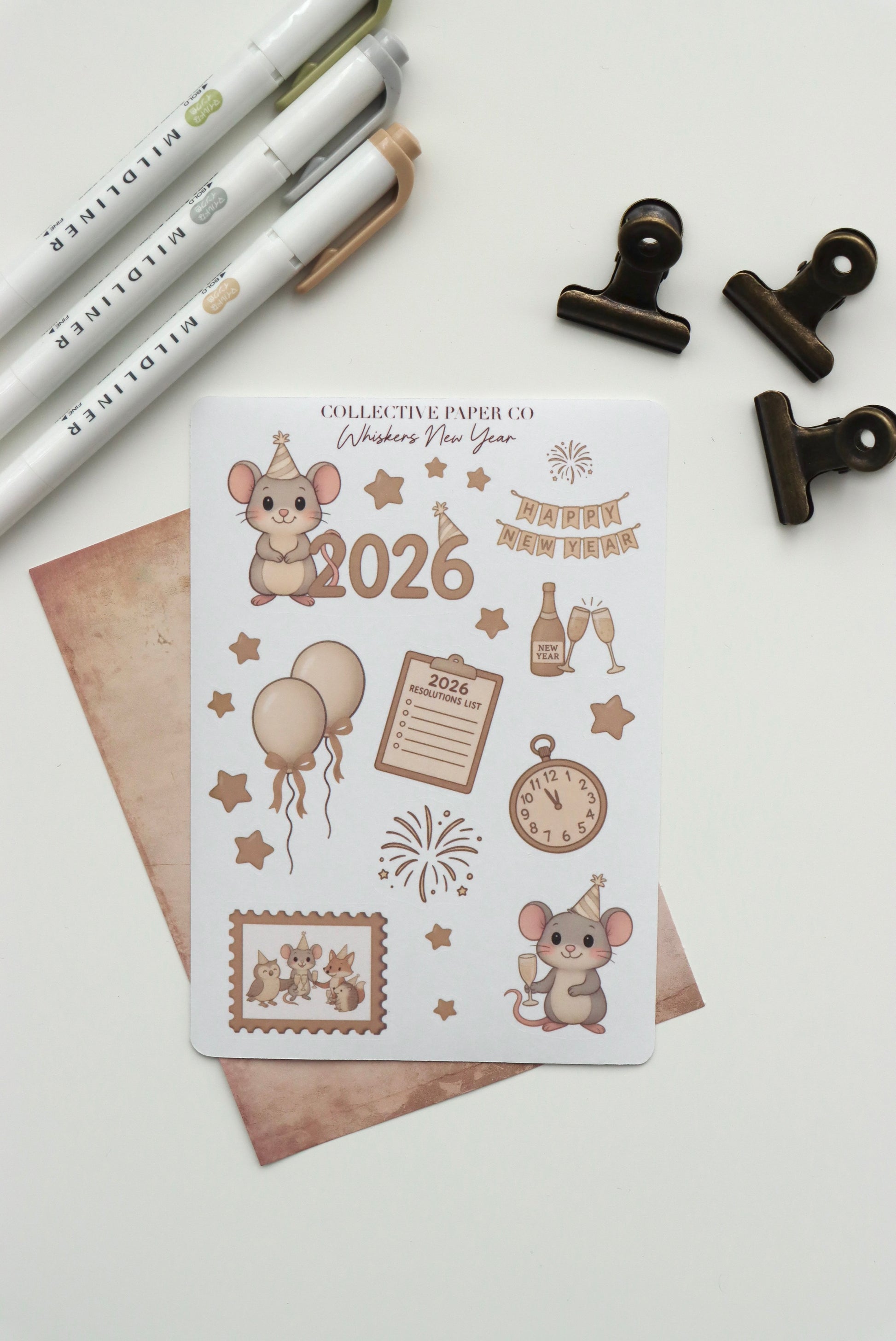 Decorative journaling sheet of kiss-cut seasonal stickers of Whiskers New Year 2026 celebration on Japanese washi paper