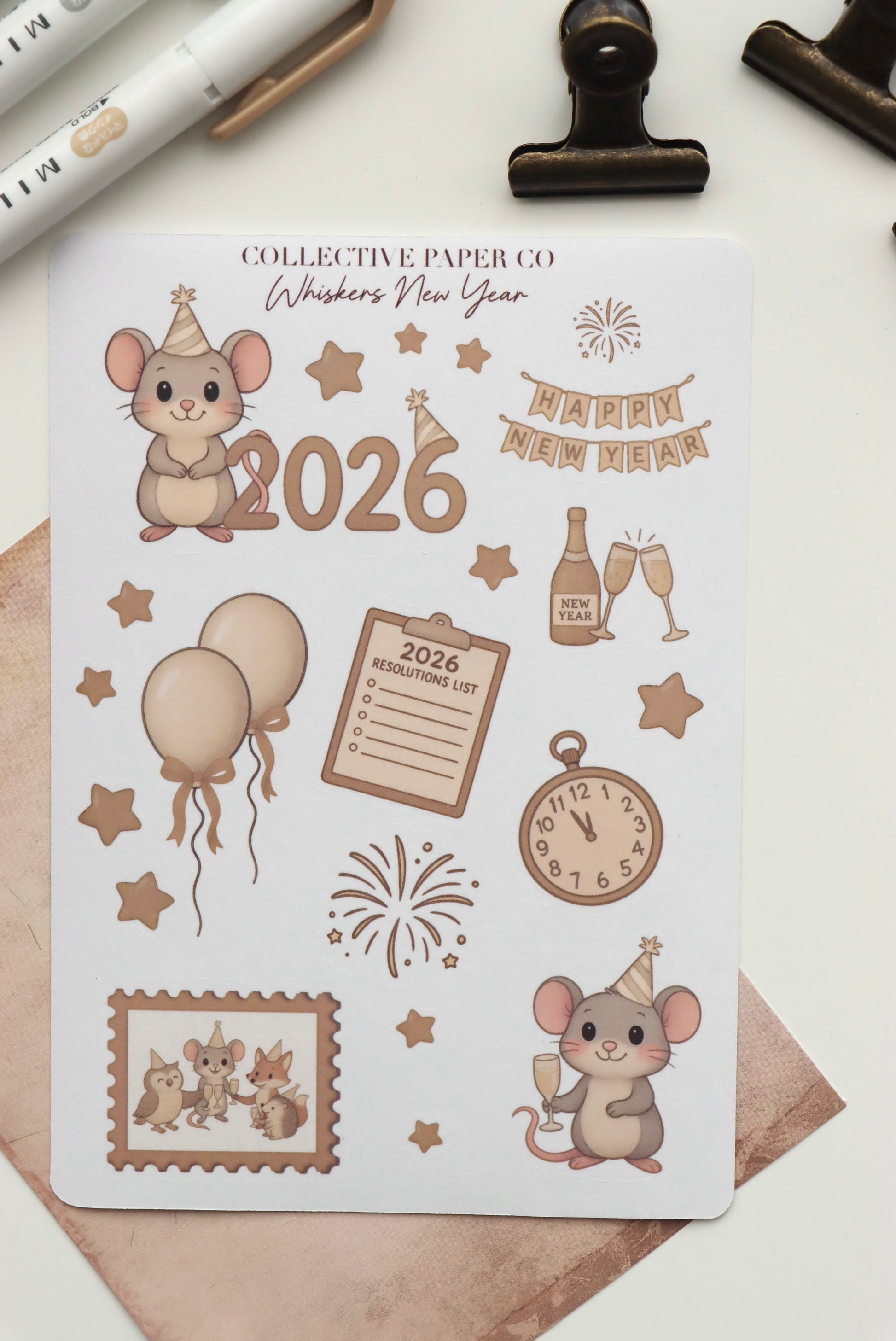 Decorative journaling sheet of kiss-cut seasonal stickers of Whiskers New Year 2026 celebration on Japanese washi paper