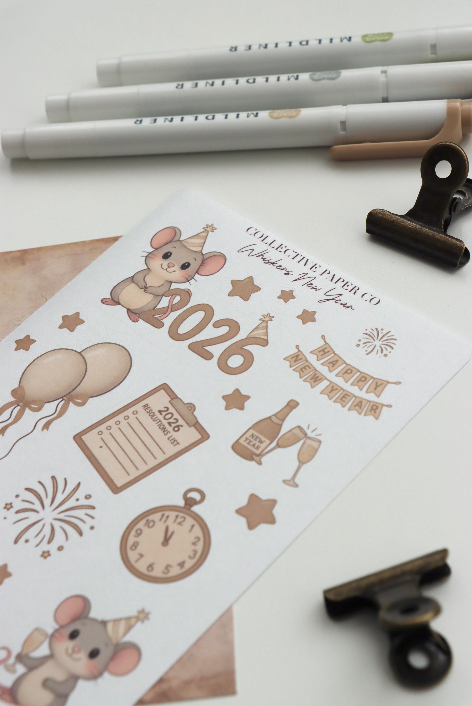 Decorative journaling sheet of kiss-cut seasonal stickers of Whiskers New Year 2026 celebration on Japanese washi paper