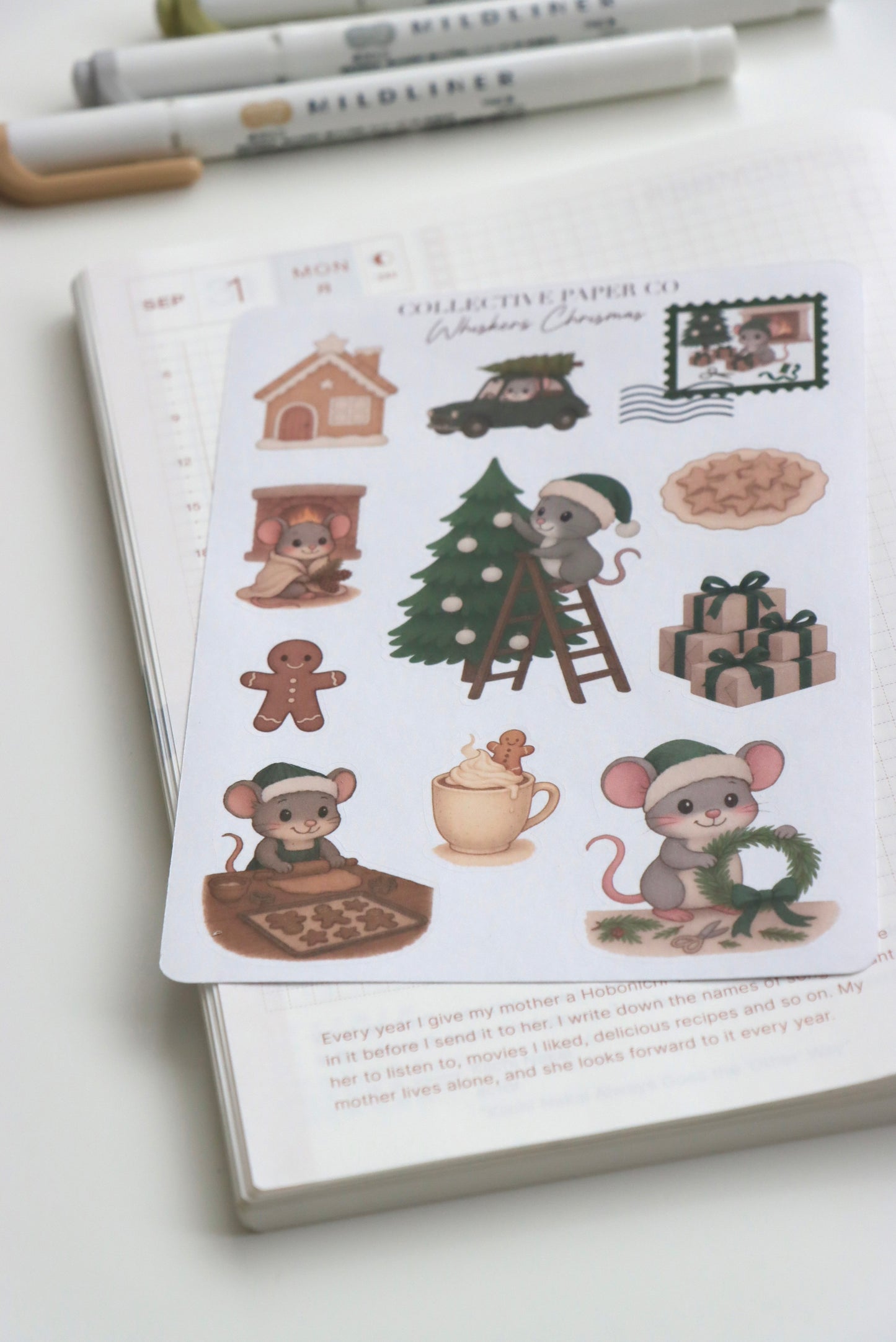 Decorative journaling sheet of kiss-cut seasonal stickers of Whiskers Christmas on Japanese washi paper