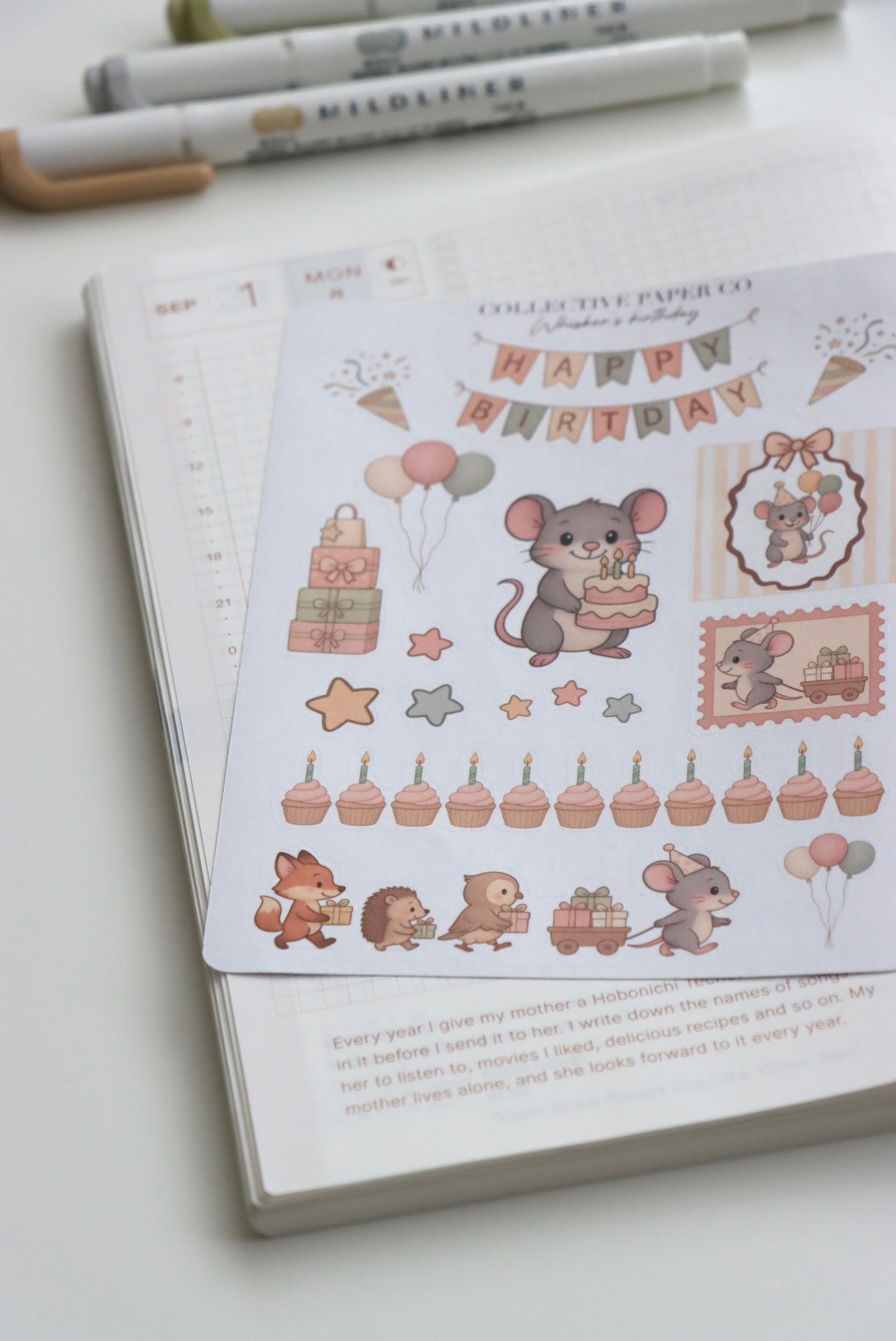 Decorative journaling sheet of kiss-cut stickers of Whisker's birthday celebration on Japanese washi paper