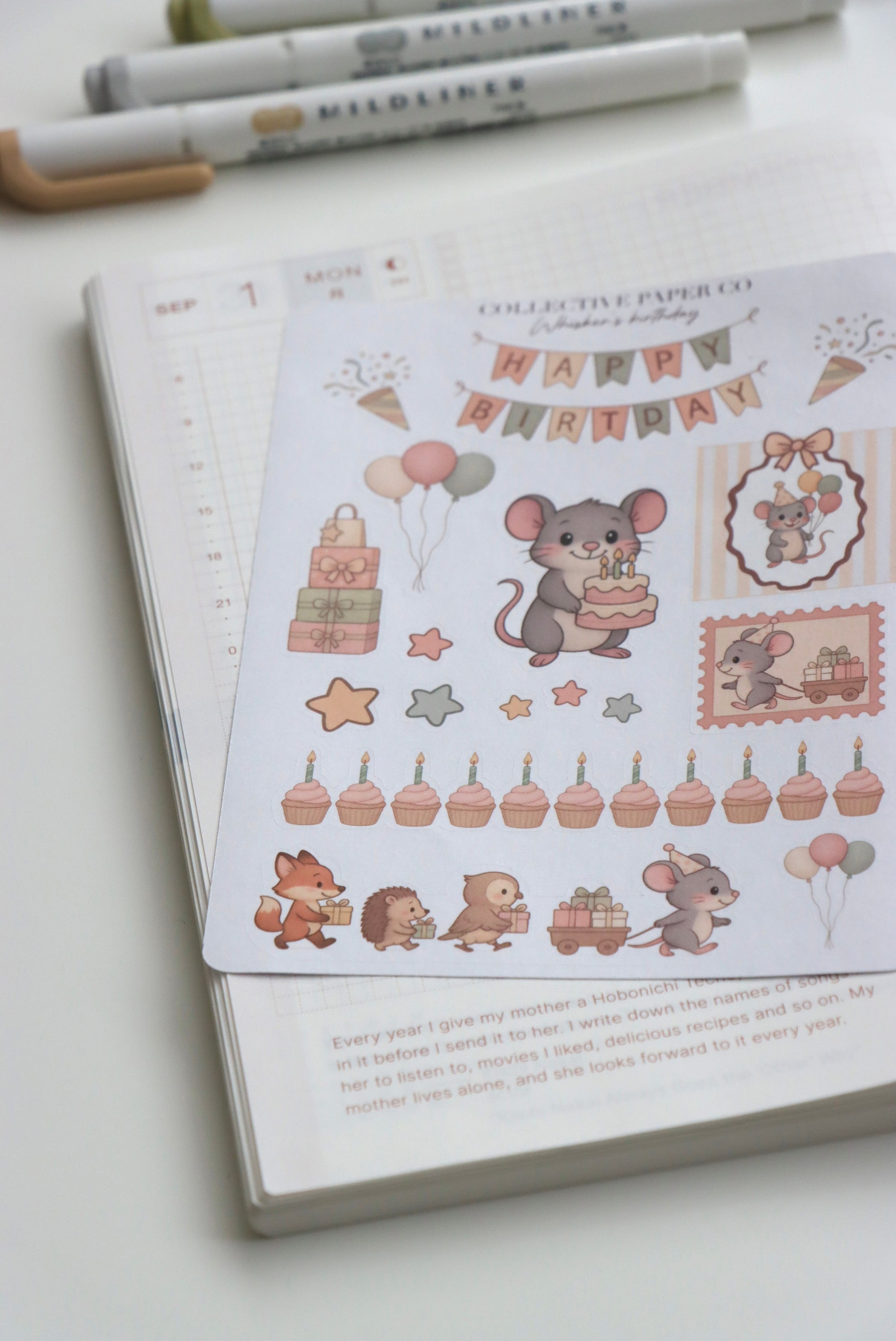 Decorative journaling sheet of kiss-cut stickers of Whisker's birthday celebration on Japanese washi paper
