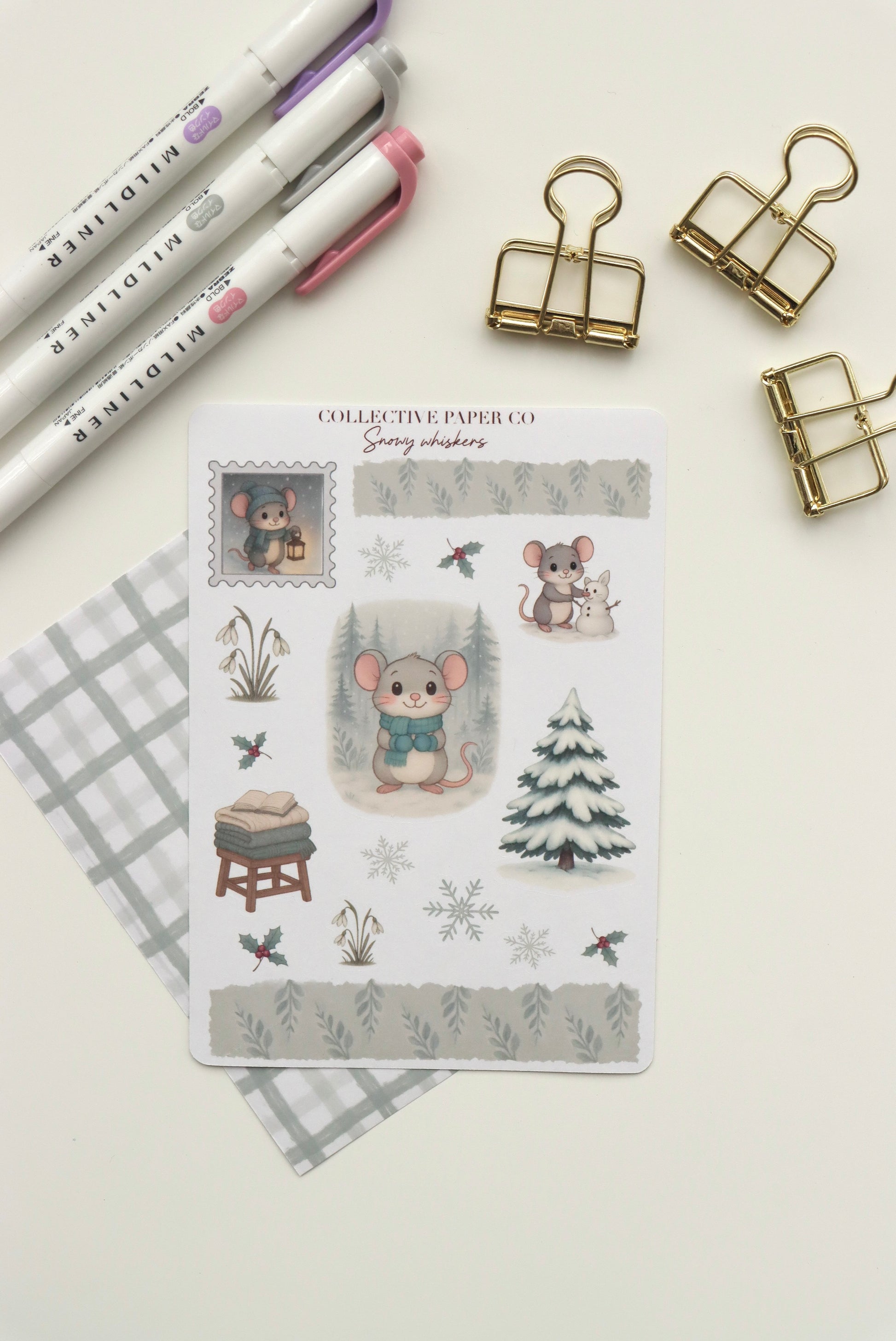Decorative journaling sheet of kiss-cut seasonal stickers of Snowy Whiskers on Japanese washi paper