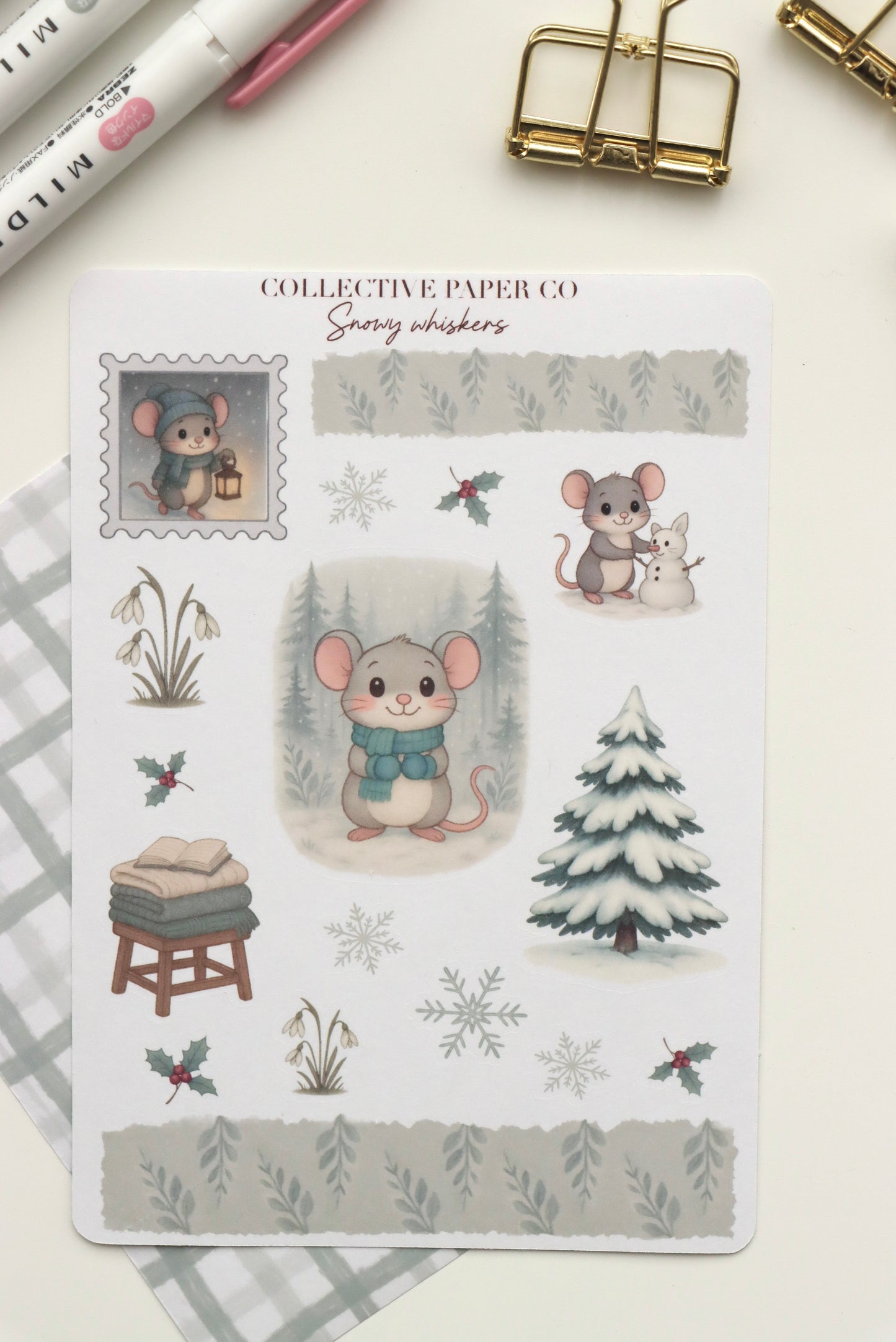 Decorative journaling sheet of kiss-cut seasonal stickers of Snowy Whiskers on Japanese washi paper