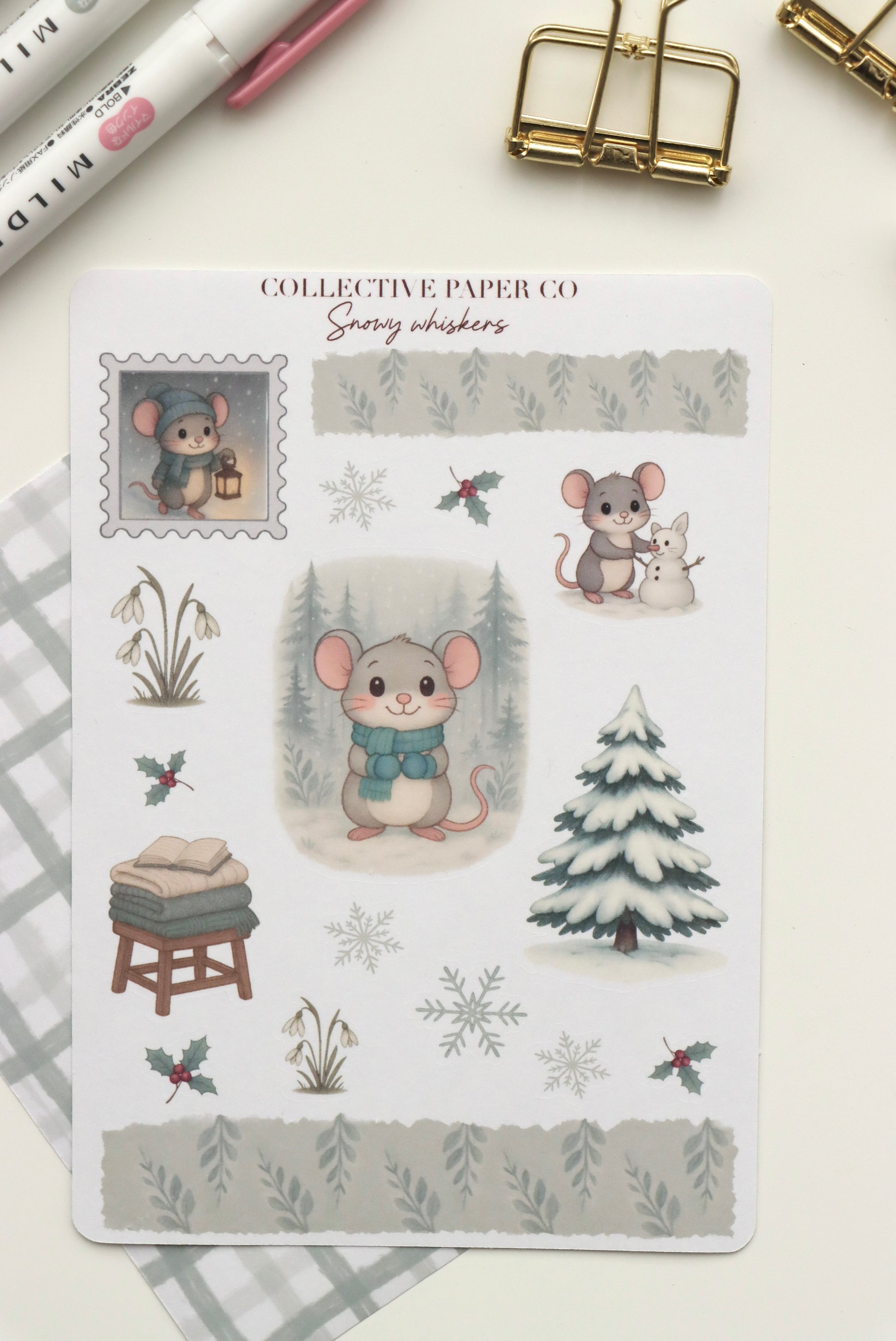 Decorative journaling sheet of kiss-cut seasonal stickers of Snowy Whiskers on Japanese washi paper