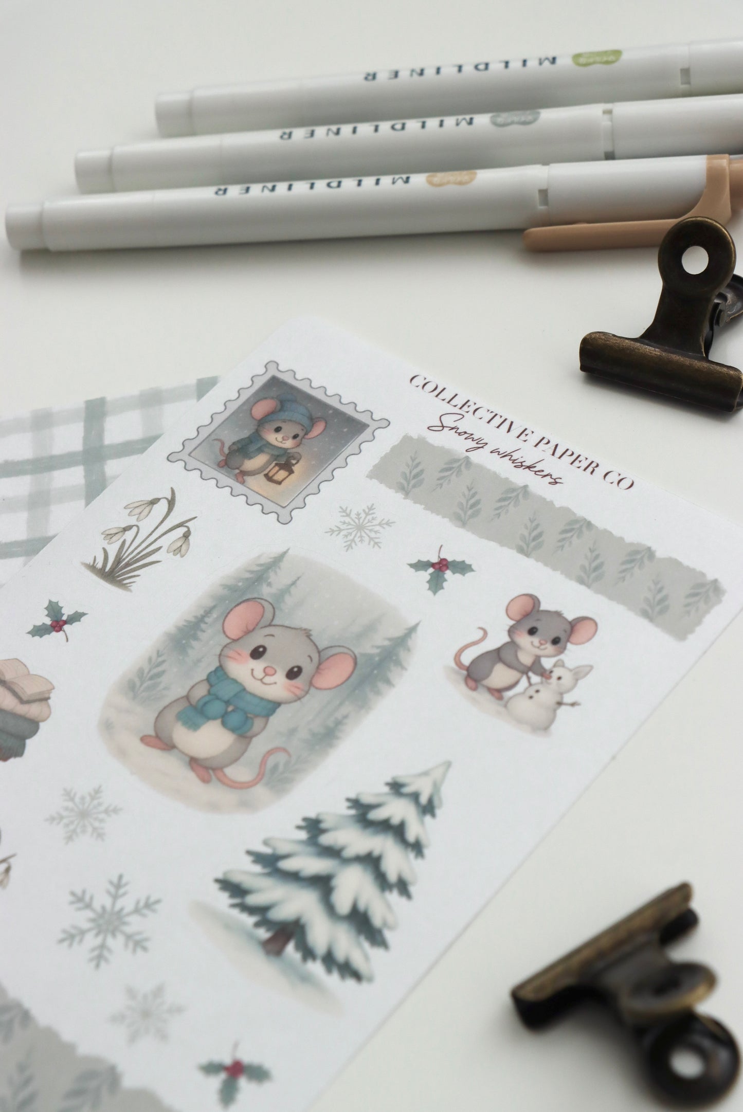 Decorative journaling sheet of kiss-cut seasonal stickers of Snowy Whiskers on Japanese washi paper
