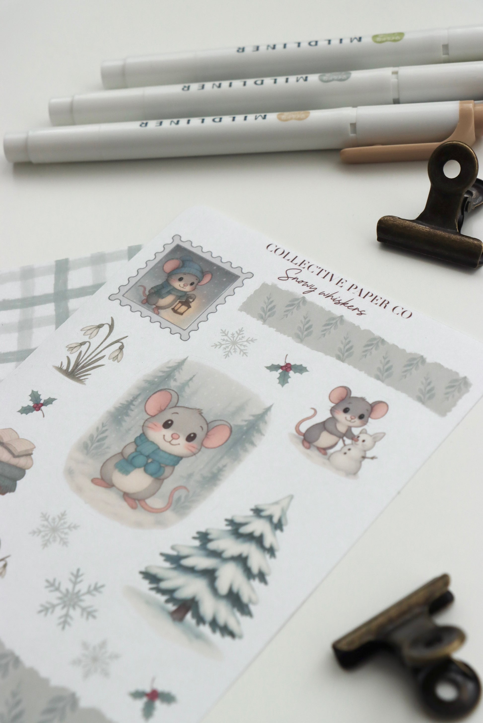 Decorative journaling sheet of kiss-cut seasonal stickers of Snowy Whiskers on Japanese washi paper