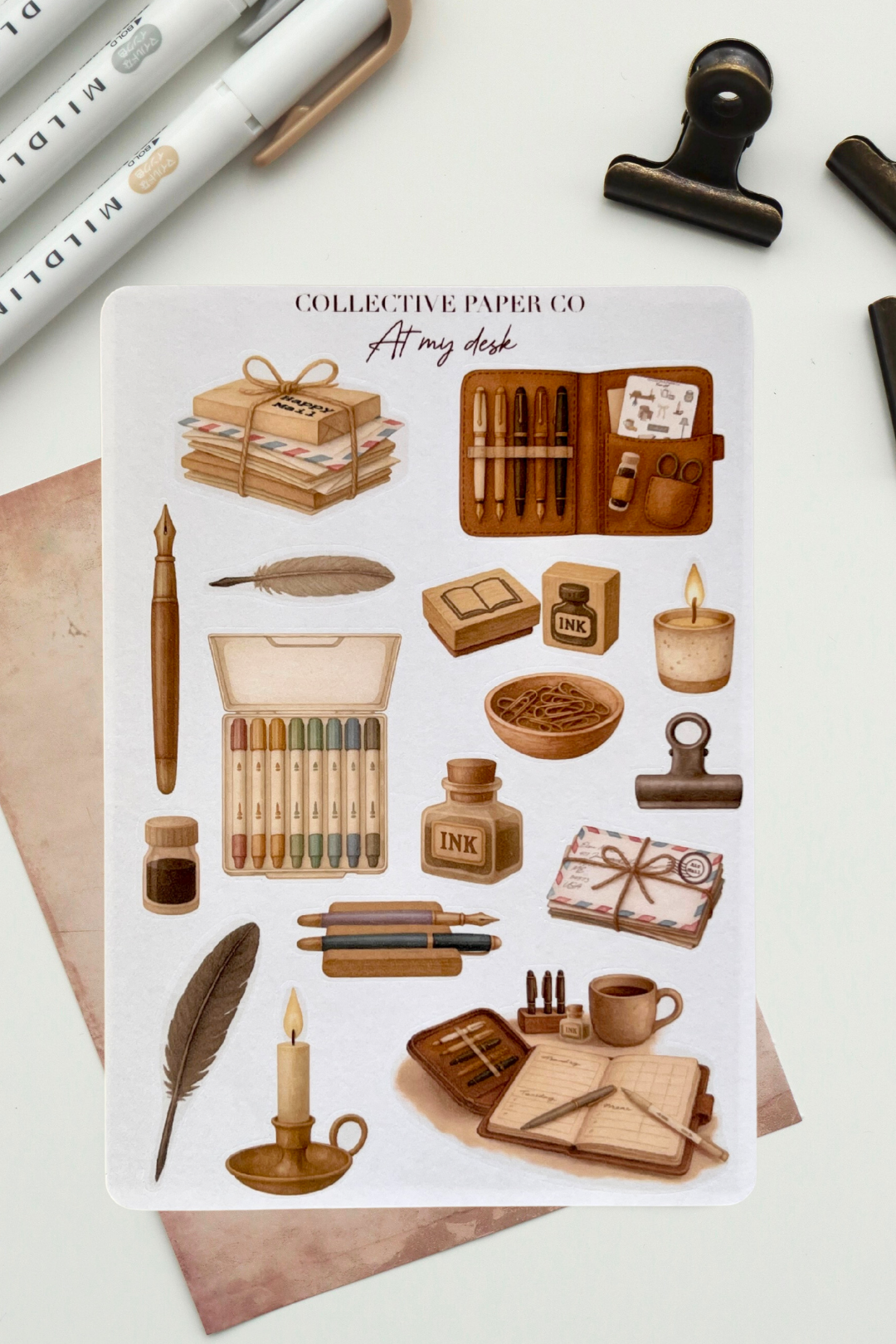 Sheet of stickers with stationery items and 'Collective Paper Co' branding on a white background.