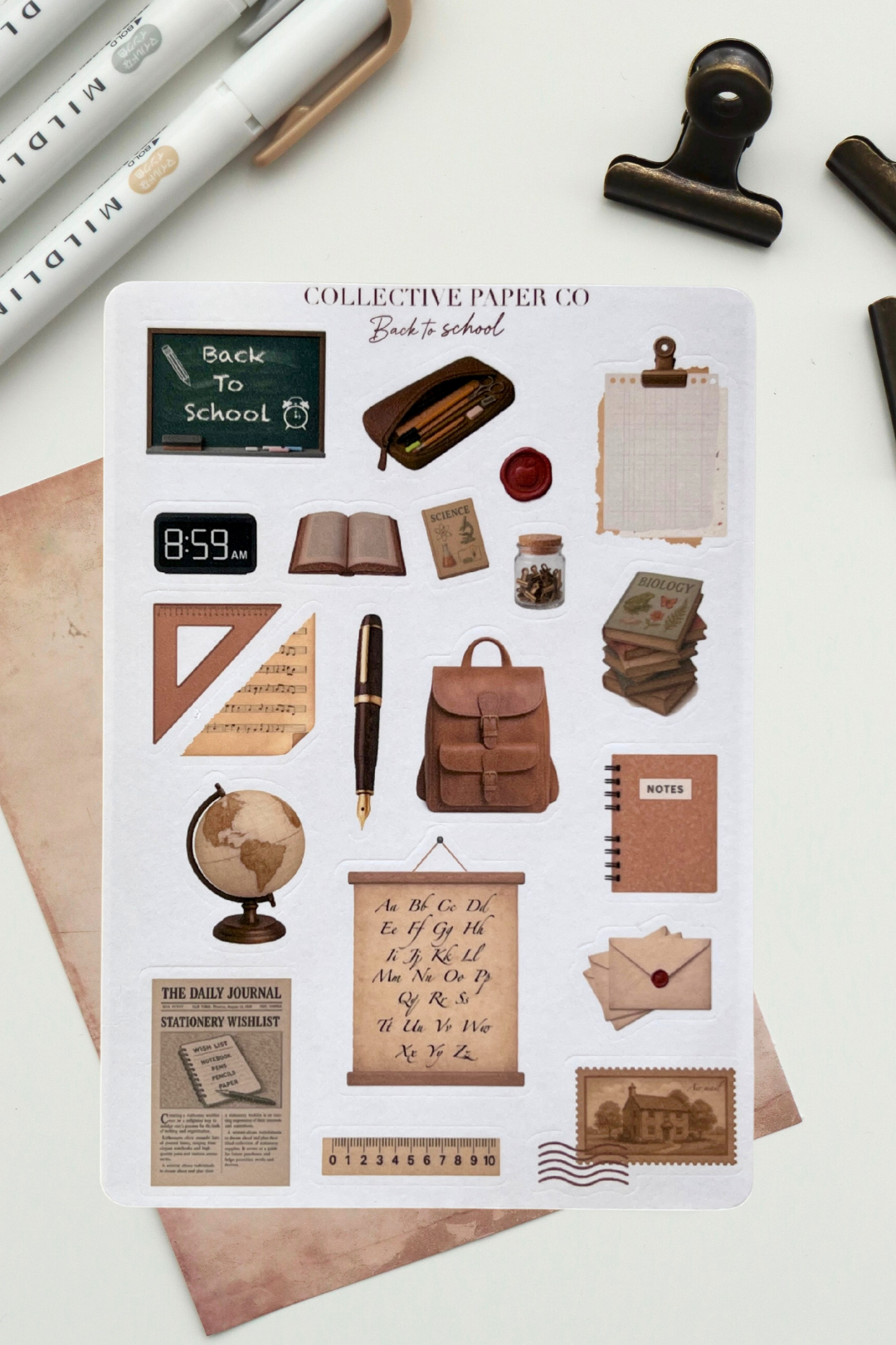 Sheet of back-to-school themed stickers with stationery items on a white background.