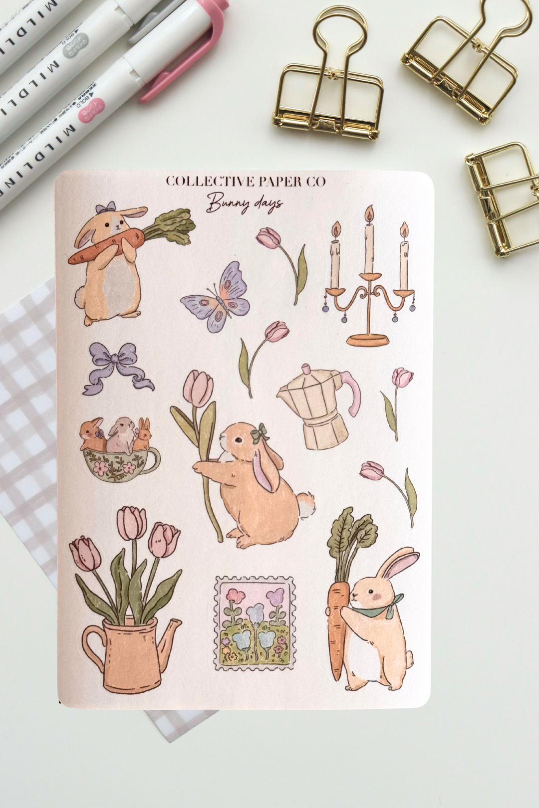 Bunny days sticker sheet with soft crayon style illustrations of rabbits, tulips, butterflies, candlestick, coffee pot, teacup with bunnies and a spring garden postage stamp from Collective Paper Co