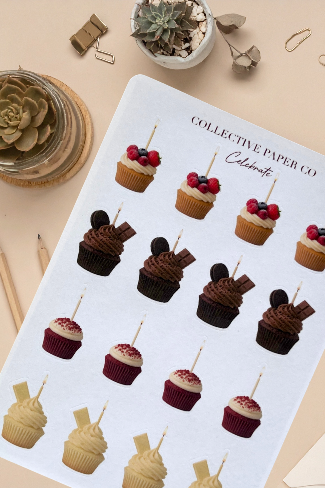 Sticker sheet with cupcake designs on a notebook