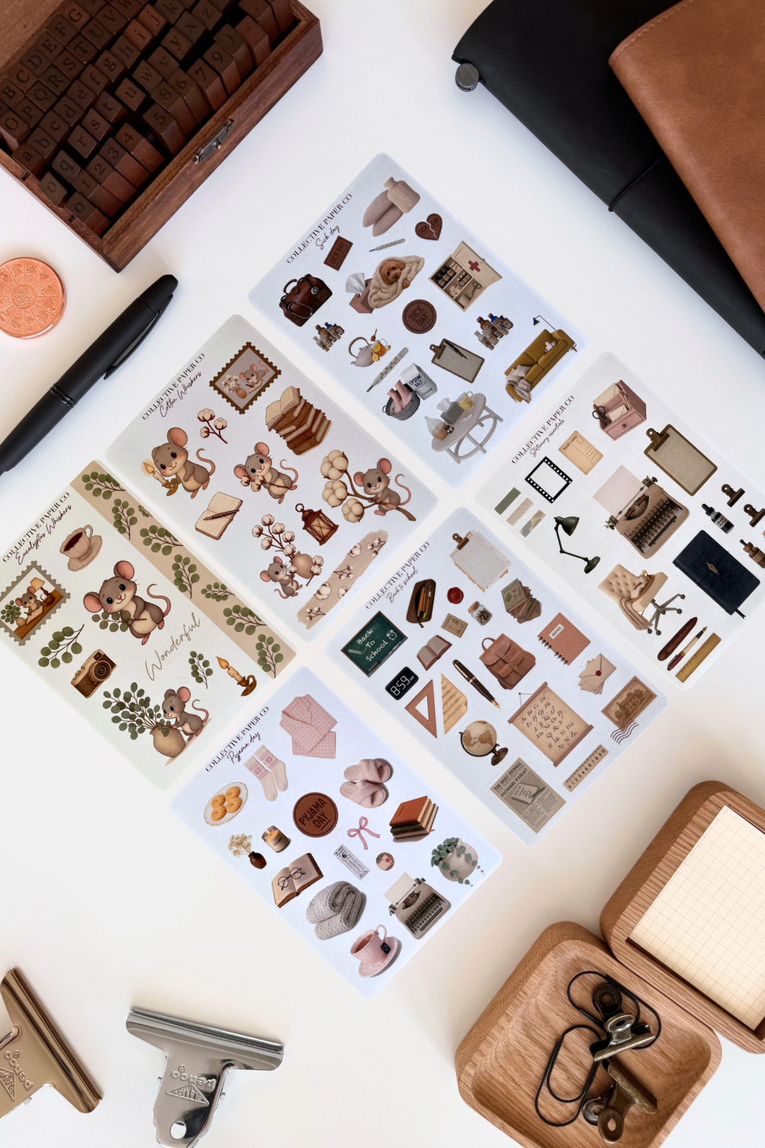 Full CPC collection volume one of decorative stickers on a white surface with stationery items.