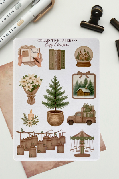 Collection of Christmas-themed stickers by Collective Paper Co. on a white background with stationery items.