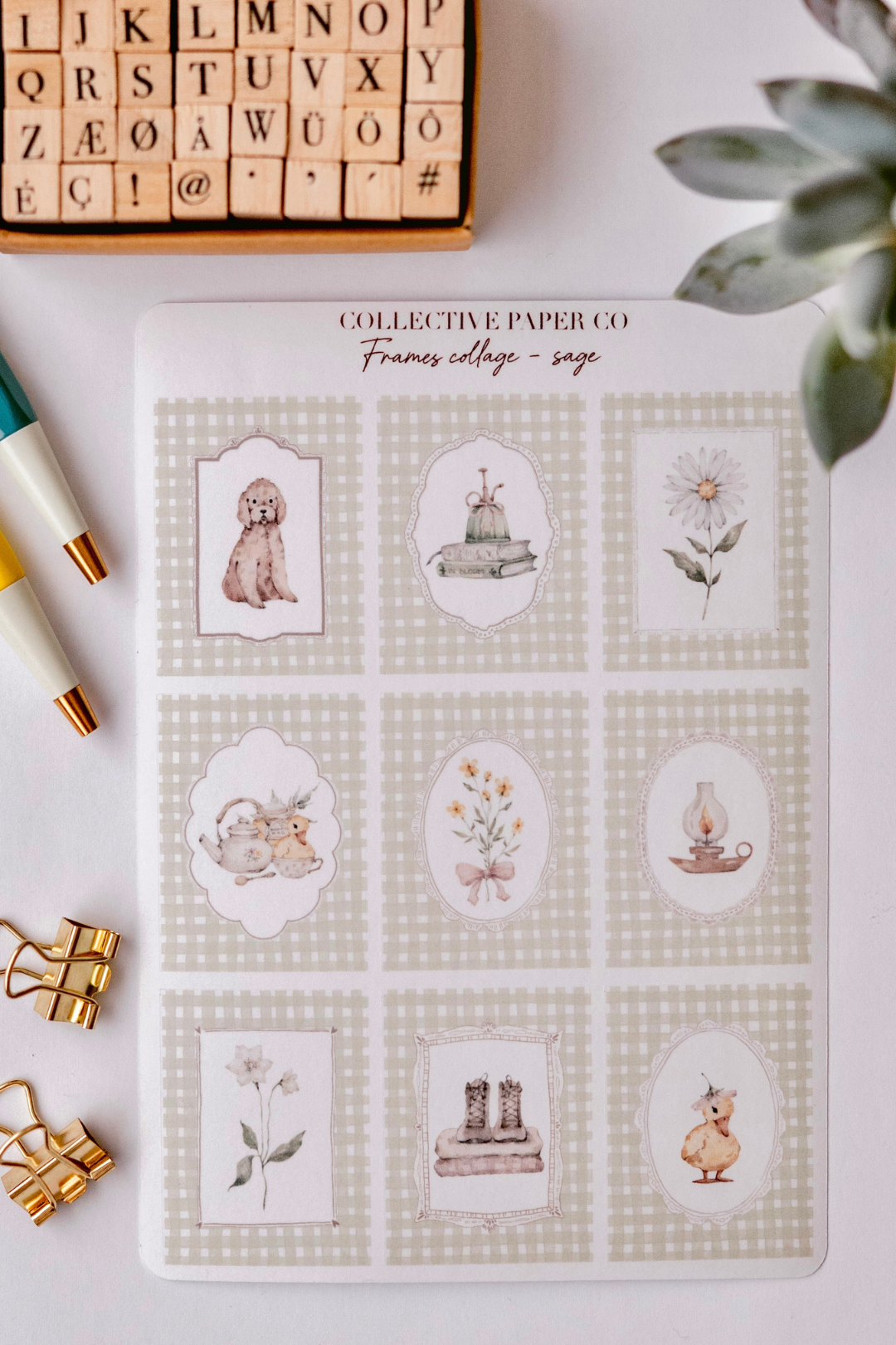 Collective Paper Co.'s Cottage Sage Frames washi tape features watercolor frames with dogs, books, daisies, teapots with cats, lanterns, boots, ducks, and ribbons in sage green.
​