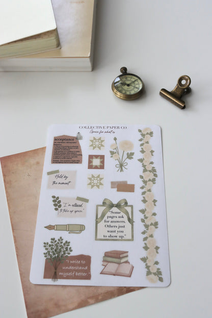 Decorative journaling sheet of kiss-cut acceptance / motivational quotes and  decorative floral and doodle style elements stickers on Japanese washi paper