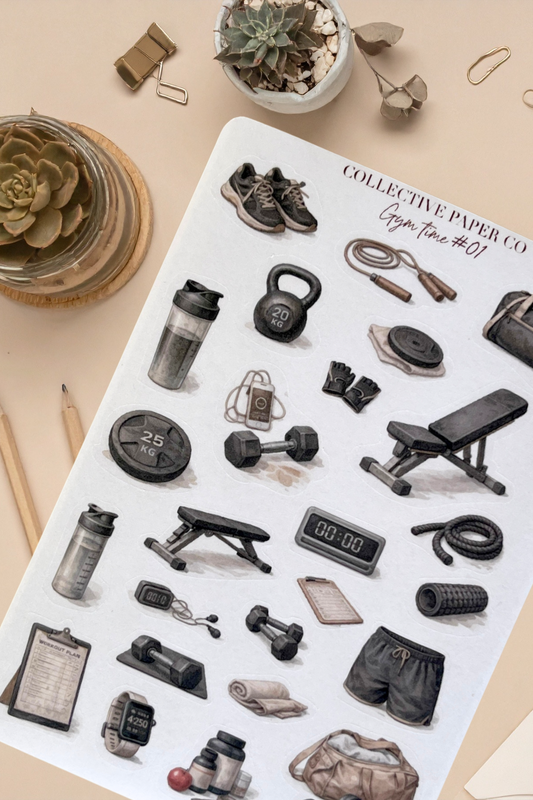 Sheet of gym-themed stickers with various fitness items on a beige surface.