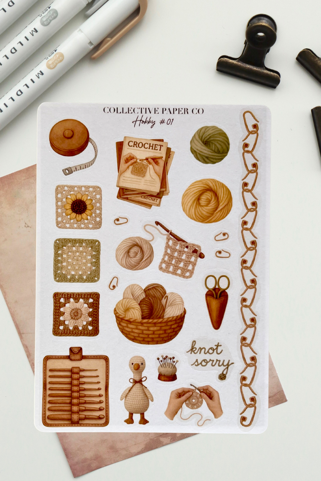 Sheet of decorative stickers with crochet-themed illustrations on a white background.