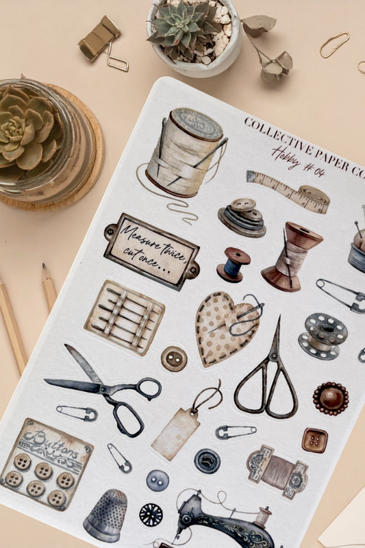 Sheet of decorative paper with vintage-style illustrations on a beige surface.