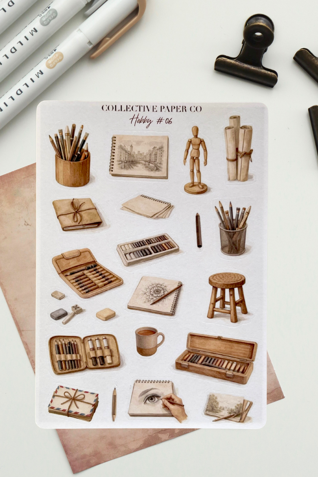 Sheet of stickers with illustrations of stationery items on a white background