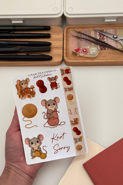 Sheet of stickers with mouse designs held by a hand, with stationery items in the background.