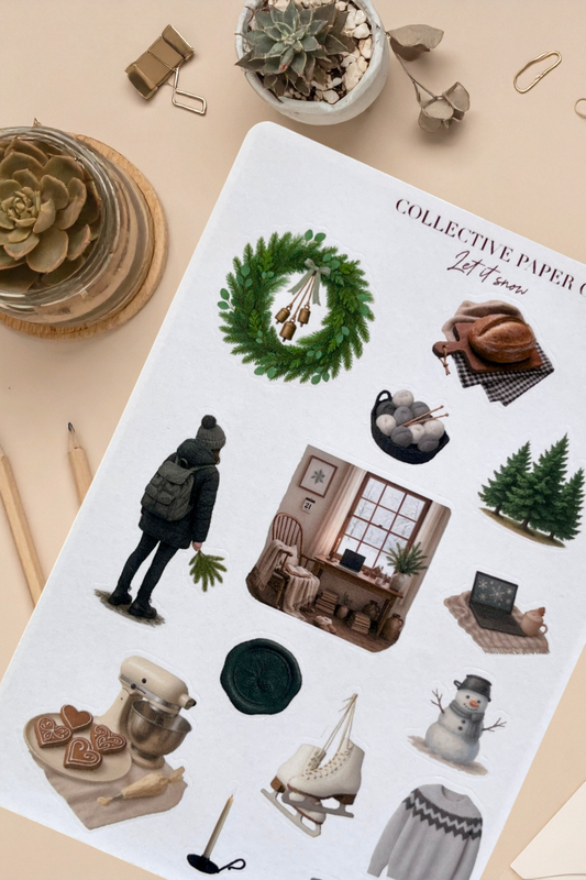 Sheet of decorative stickers with various designs on a beige surface.