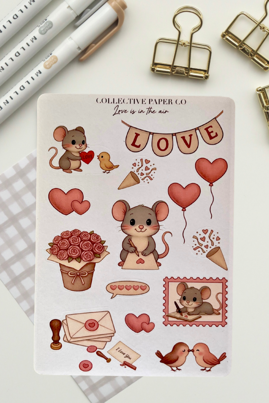Sheet of stickers with cartoon mice, hearts, and other Valentine's Day elements on a white background.