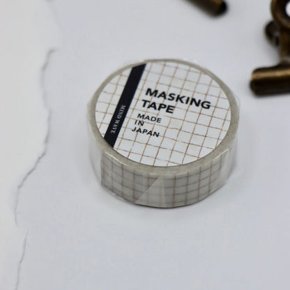 Roll of masking tape with grid pattern 