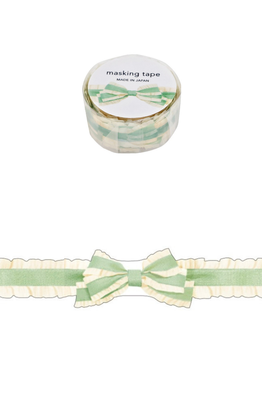 Roll of green bow masking tape made in Japan with ribbon accents on white background.