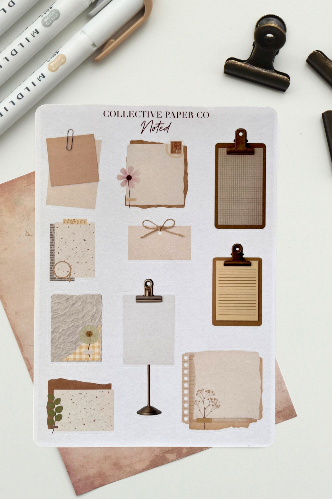 Sheet of stationery items from Collective Paper Co. on a white background with stationery tools.