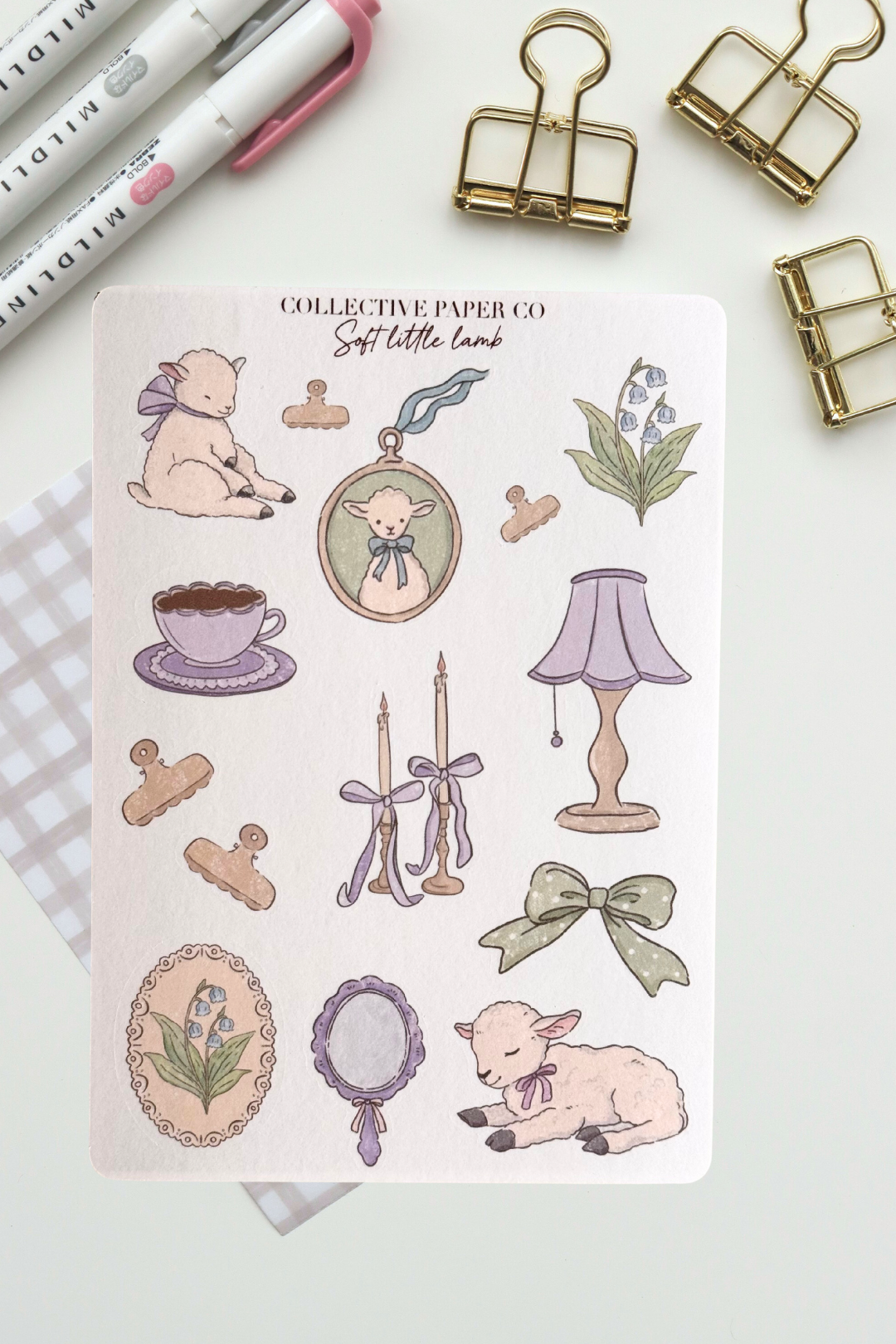 Soft little lamb sticker sheet with pastel crayon style illustrations of lambs, tea cup, candles, lamp, ribbons, florals and vintage frames in gentle lilac and sage tones from Collective Paper Co