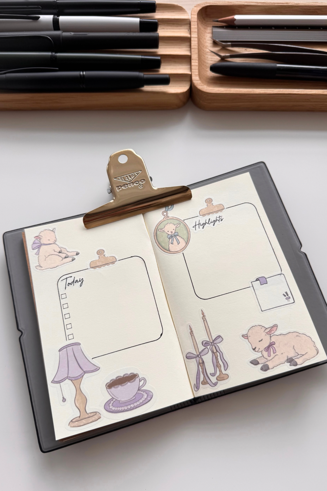 Soft little lamb sticker sheet with pastel crayon style illustrations of lambs, tea cup, candles, lamp, ribbons, florals and vintage frames in gentle lilac and sage tones from Collective Paper Co