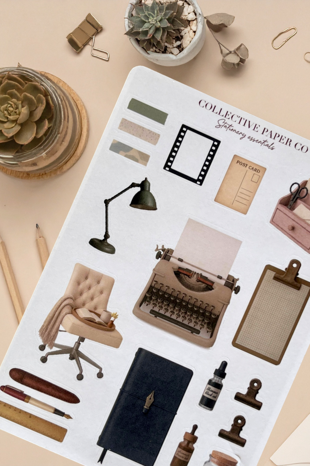 Sticker sheet with office-themed illustrations on a beige surface with office supplies.