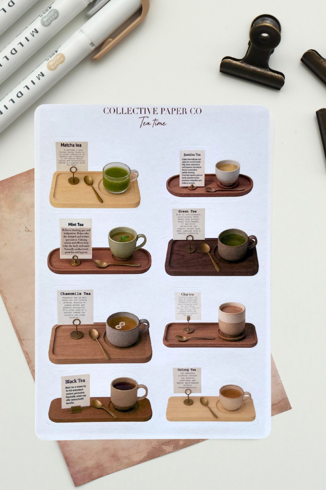 Tea set with wooden trays and cups on a white background, featuring 'Collective Paper Co.' branding.