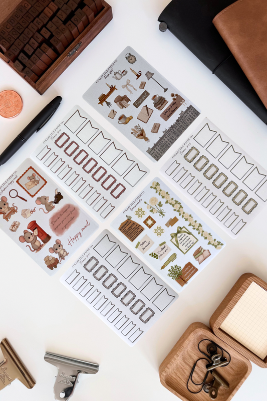 Collection of planner stickers and accessories on a white surface