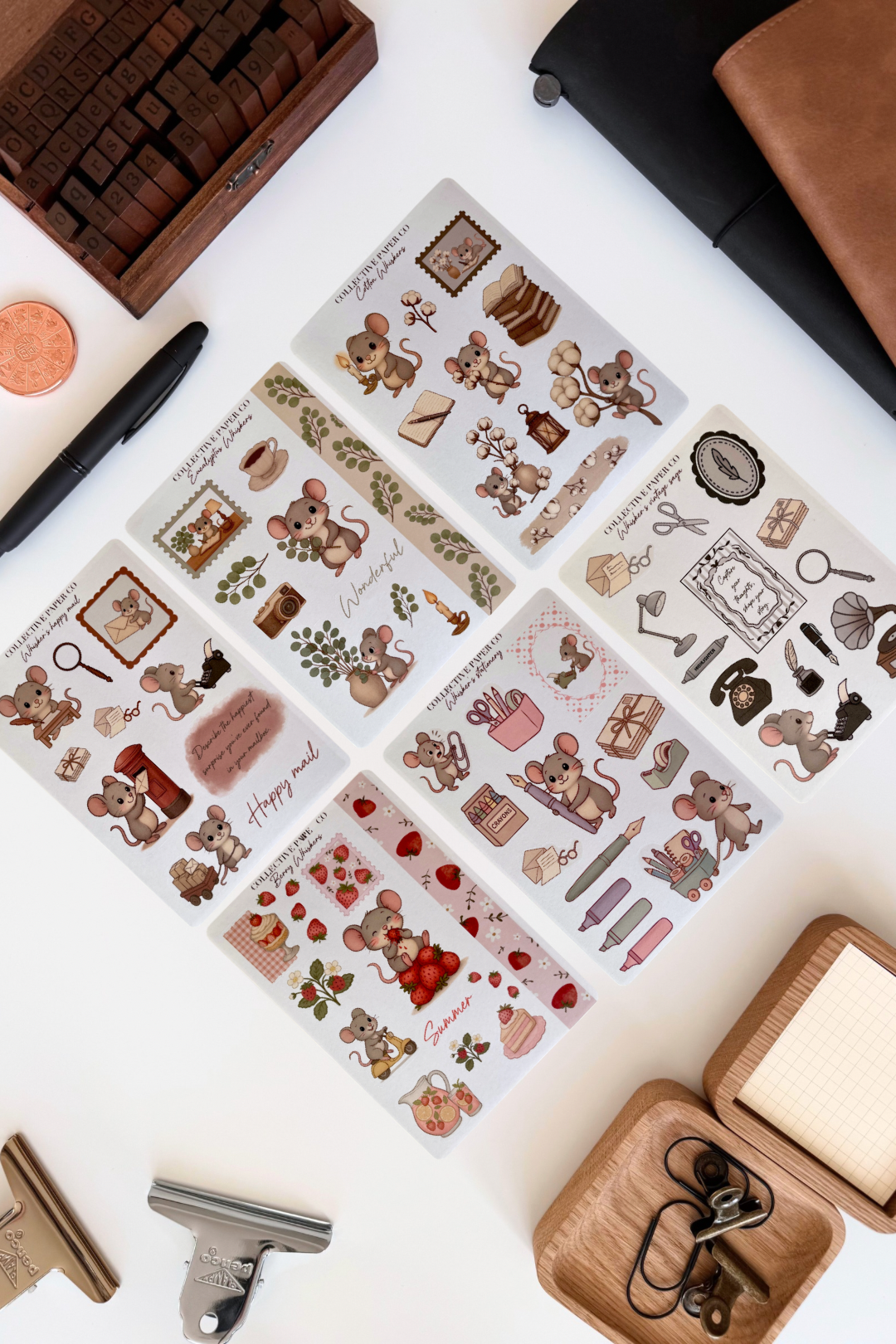 Full collection of Whiskers chapter one decorative stickers on a white surface with stationery items.