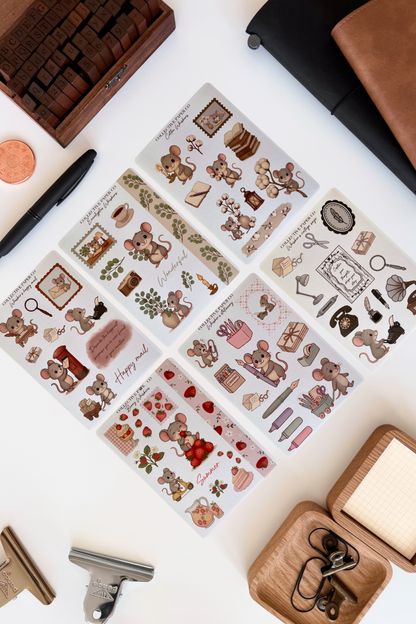 Full collection of Whiskers chapter one decorative stickers on a white surface with stationery items.