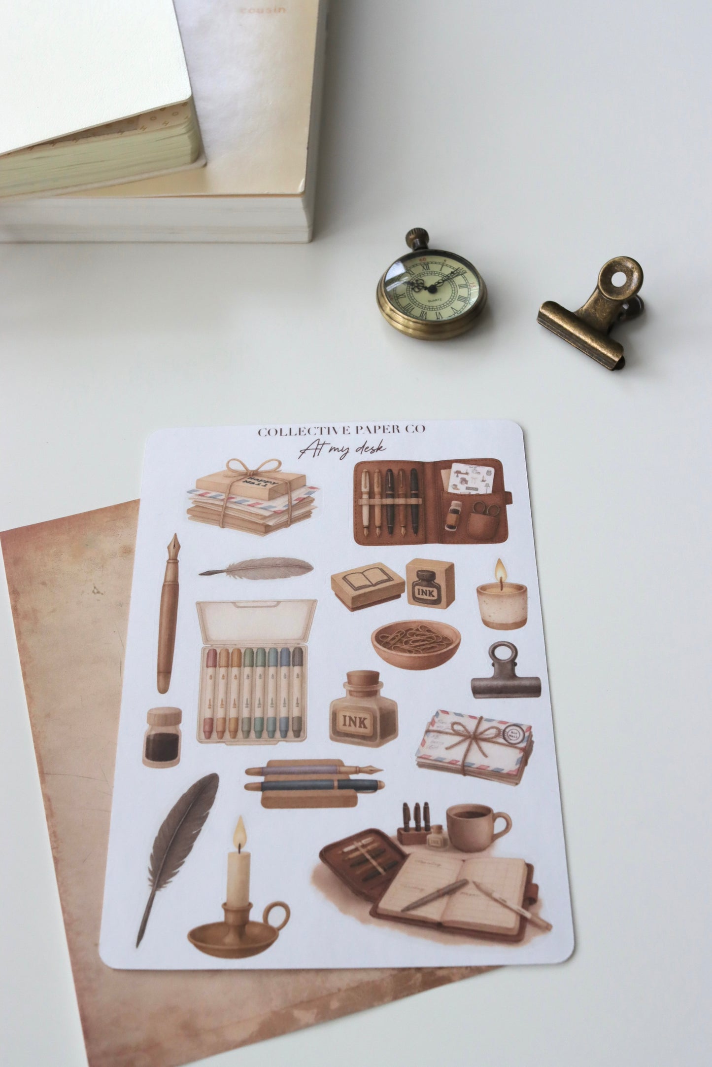 Decorative journaling sheet of kiss-cut  vintage watercolour  illustrations of stationery items on Japanese washi paper