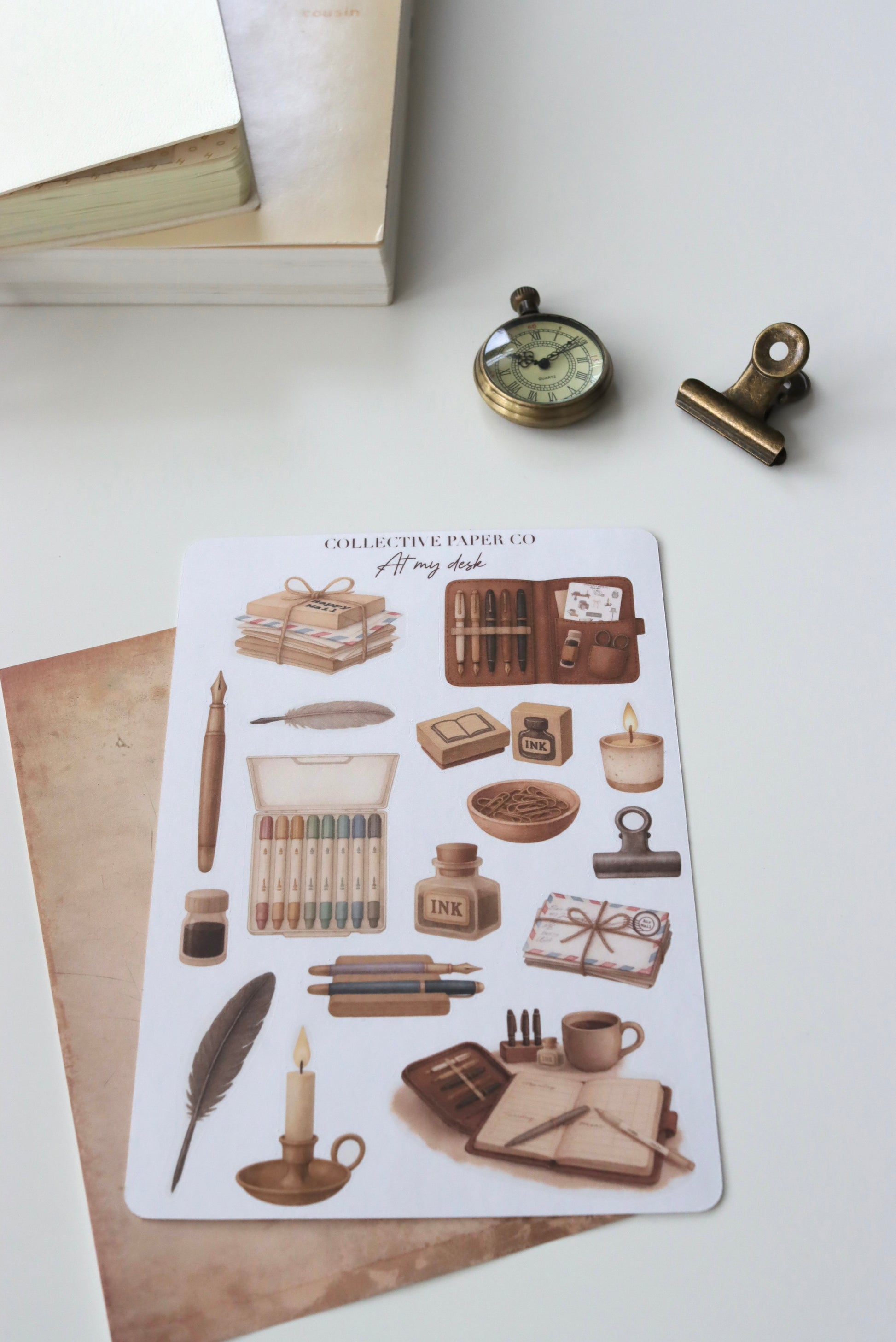 Decorative journaling sheet of kiss-cut  vintage watercolour  illustrations of stationery items on Japanese washi paper