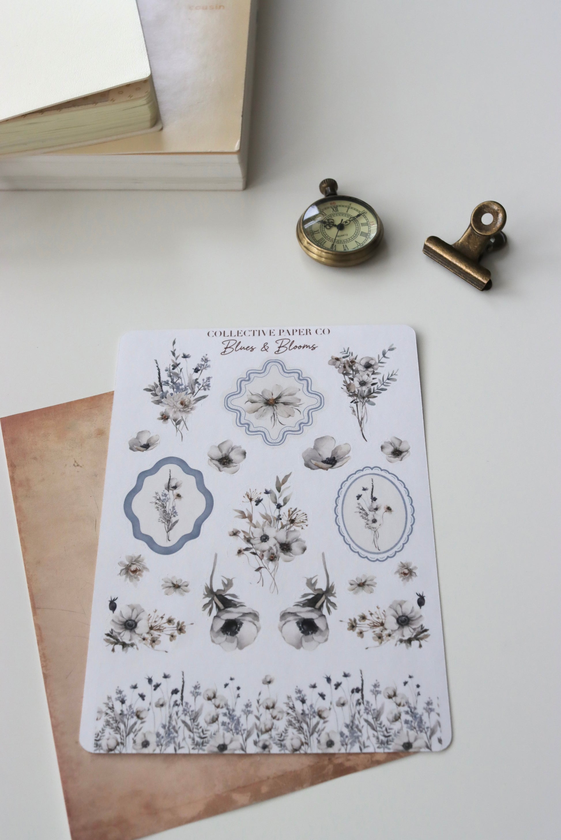 Decorative journaling sheet of kiss-cut watercolour floral elements stickers on Japanese washi paper
