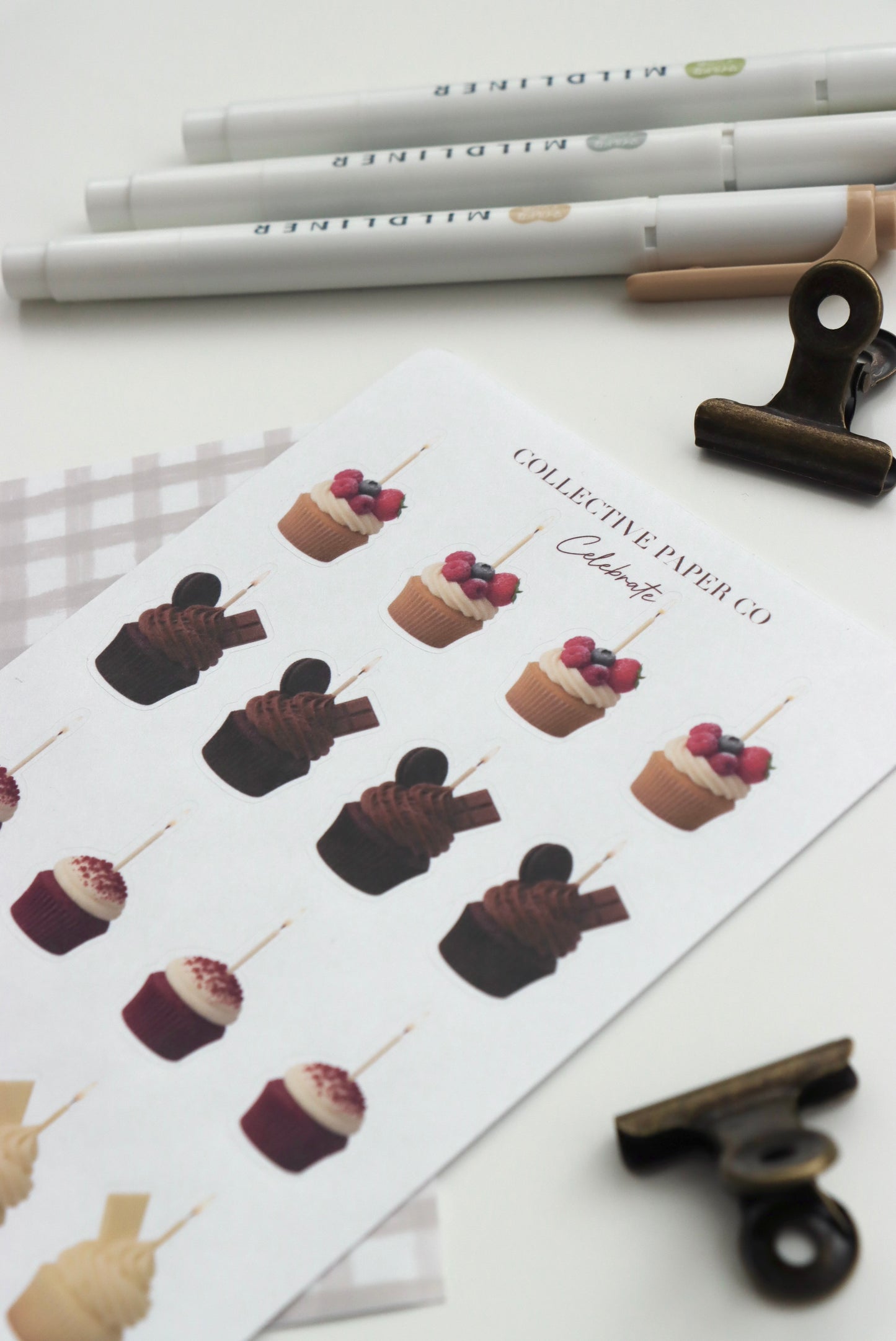 Decorative journaling sheet of kiss-cut vintage and realistic birthday cupcake stickers on Japanese washi paper 