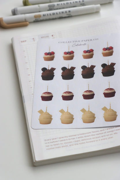 Decorative journaling sheet of kiss-cut vintage and realistic birthday cupcake stickers on Japanese washi paper